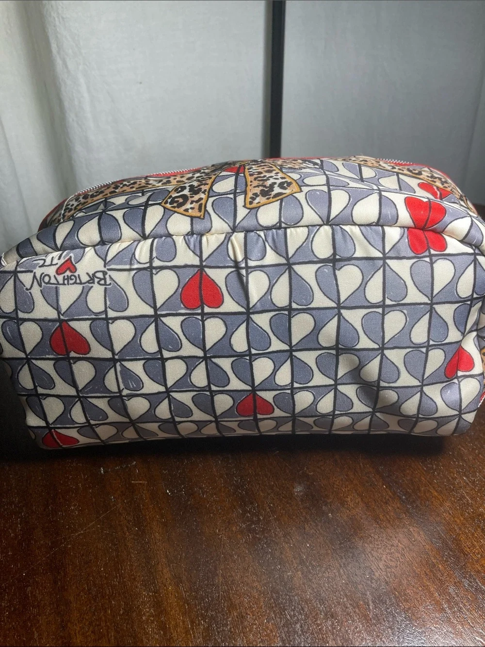 Brighton Wild Love cosmetic bag with bold leopard print and playful bow NWOT